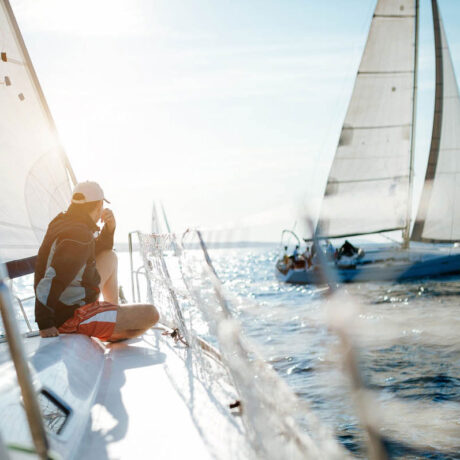 young-man-relaxing-on-his-sailboat