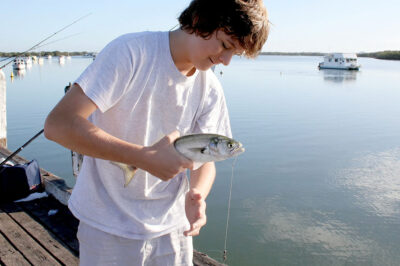 young-man-caught-tailor-running-sinker-rig
